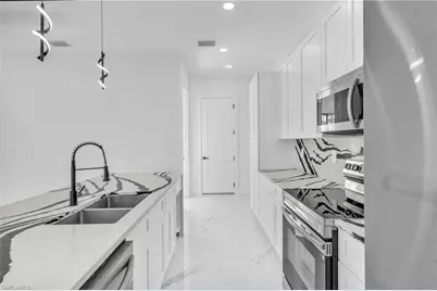 3409 24th St SW, Lehigh Acres, FL 33976 - Photo 5