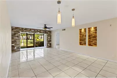 5697 Rattlesnake Hammock Rd #C-105, Naples, FL 34113 - Photo 5