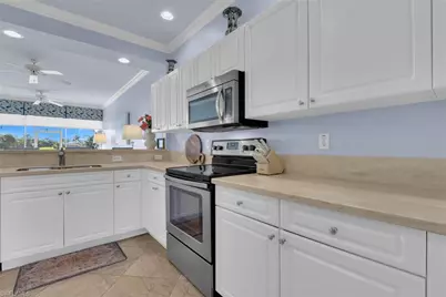 7895 Mahogany Run Ln #1414, Naples, FL 34113 - Photo 5