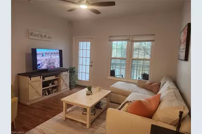 23560 Walden Center Dr #207, Estero, FL 34134 - Photo 1