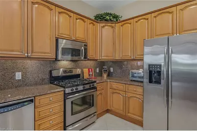 8987 Cherry Oaks Trl #202, Naples, FL 34114 - Photo 3