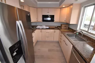 5667 Rattlesnake Hammock Rd #B-205, Naples, FL 34113 - Photo 5