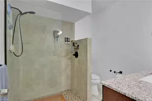 2667 River Reach Dr, Naples, FL 34104 - Photo 13