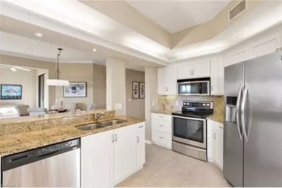 7008 Pelican Bay Blvd #H502, Naples, FL 34108 - Photo 11