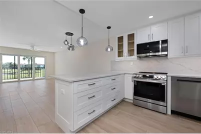 13 High Point Cir N #206, Naples, FL 34103 - Photo 1