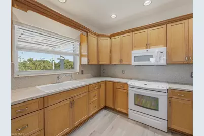 105 Pago Pago Dr W, Naples, FL 34113 - Photo 9