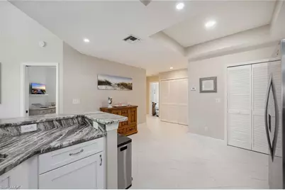 11412 Quail Villag Way Way #102, Naples, FL 34119 - Photo 7