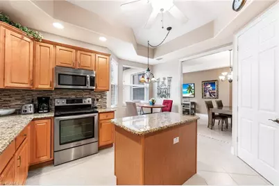 6057 Ashford Ln #402, Naples, FL 34110 - Photo 7