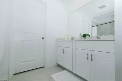 20080 Caroline Creek Pl, Lehigh Acres, FL 33974 - Photo 19