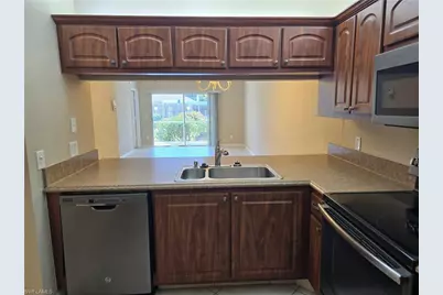 2656 Kings Lake Blvd #7-101, Naples, FL 34112 - Photo 5