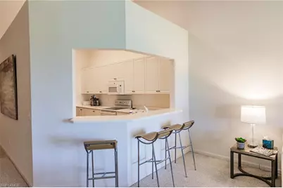 3940 Deer Crossing Ct #4-203, Naples, FL 34114 - Photo 15