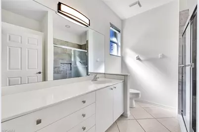 7488 Berkshire Pines Dr, Naples, FL 34104 - Photo 17