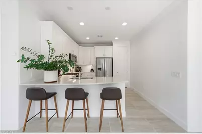 7733 Jacaranda Ln, Naples, FL 34114 - Photo 9