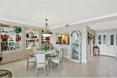 11660 Quail Village Way, Naples, FL 34119 - Photo 9