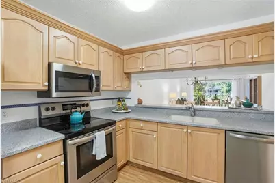 5654 Woodmere Lake Cir #C203, Naples, FL 34112 - Photo 9