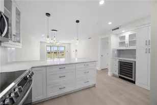 21 High Point Cir E, Naples, FL 34103 - Photo 1