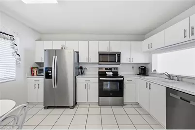 7760 Emerald Cir #S202, Naples, FL 34109 - Photo 11