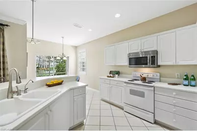 2180 Hawksridge Dr #2002, Naples, FL 34105 - Photo 9