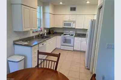 2288 Ashton Oaks Ln #7-103, Naples, FL 34109 - Photo 7