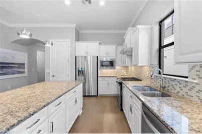 9410 Whooping Crane Way, Naples, FL 34120 - Photo 11