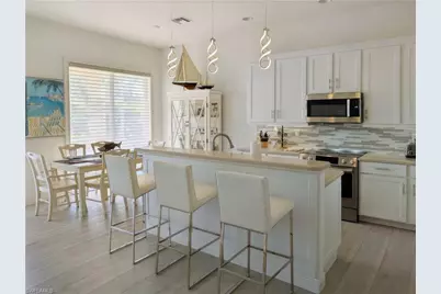 5758 Lago Villaggio Way, Naples, FL 34104 - Photo 19