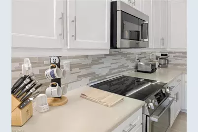 5758 Lago Villaggio Way, Naples, FL 34104 - Photo 23