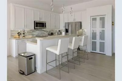 5758 Lago Villaggio Way, Naples, FL 34104 - Photo 21