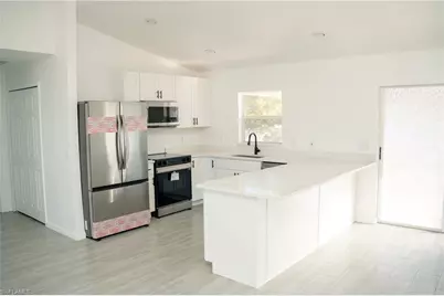 322 NE 26th Ter, Cape Coral, FL 33909 - Photo 5