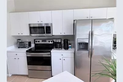 2865 Cypress Trace Cir #203, Naples, FL 34119 - Photo 5