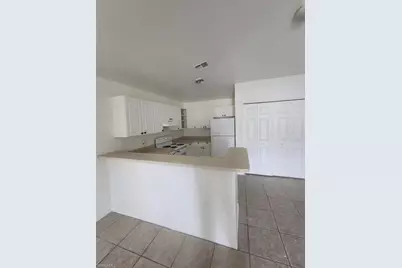 1854 55th Ter SW, Naples, FL 34116 - Photo 9