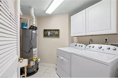 1672 Tarpon Bay Dr S #102, Naples, FL 34119 - Photo 11