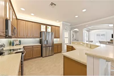 5686 Lago Villaggio Way, Naples, FL 34104 - Photo 17