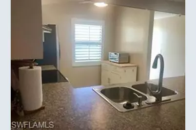 2644 Kings Lake Blvd #6-103, Naples, FL 34112 - Photo 9