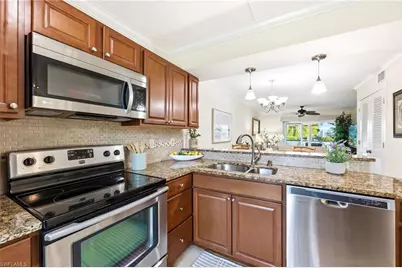 691 W Elkcam Cir #413, Marco Island, FL 34145 - Photo 7