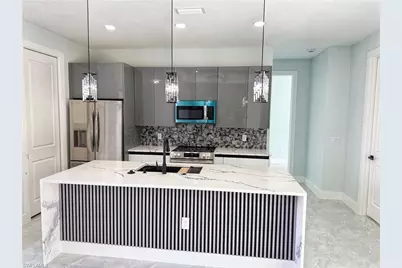 1912 SE 11th Pl, Cape Coral, FL 33990 - Photo 13