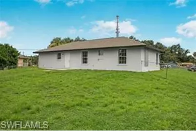 803 Monroe Dr, Lehigh Acres, FL 33936 - Photo 9