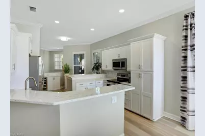 1051 Egrets Walk Cir #7-201, Naples, FL 34108 - Photo 9