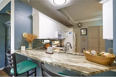 305 Robin Hood Cir #101, Naples, FL 34104 - Photo 5