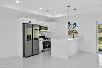 366 Butler Ave S, Lehigh Acres, FL 33974 - Photo 9