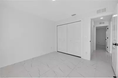 366 Butler Ave S, Lehigh Acres, FL 33974 - Photo 23