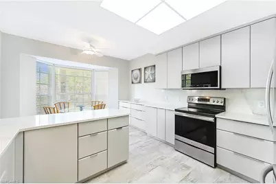 651 Wiggins Lake Dr #102, Naples, FL 34110 - Photo 7