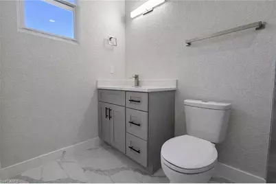 2421 Milton Ave S, Lehigh Acres, FL 33973 - Photo 17