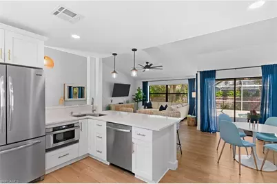 2451 River Reach Dr, Naples, FL 34104 - Photo 11