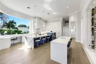 12924 Bald Cypress Ln, Naples, FL 34119 - Photo 11