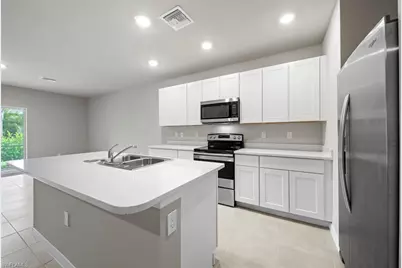 15319 Wildflower Cir, Naples, FL 34119 - Photo 5