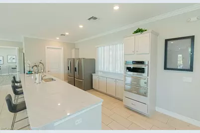 15477 Wildflower Cir, Naples, FL 34119 - Photo 33