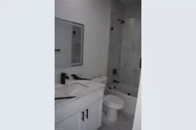 2555 25th St W, Lehigh Acres, FL 33971 - Photo 19