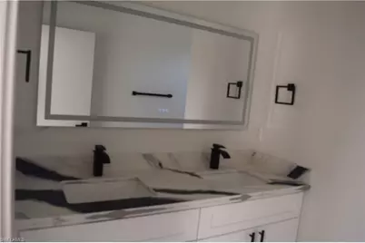 2555 25th St W, Lehigh Acres, FL 33971 - Photo 31