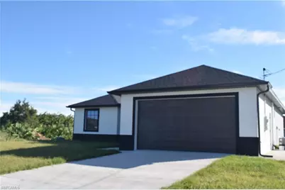 2555 25th St W, Lehigh Acres, FL 33971 - Photo 3