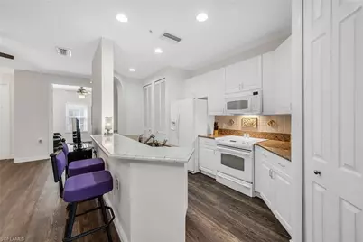 1360 Sweetwater Cv #102, Naples, FL 34110 - Photo 13